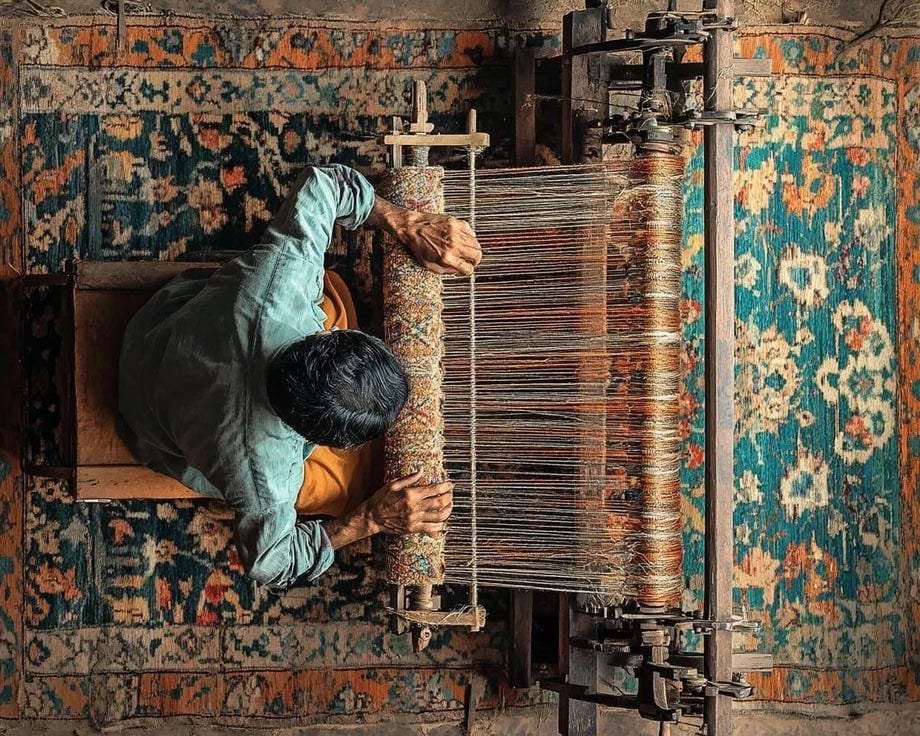 Bhulia weaver creating Habaspuri saree on traditional wooden loom in Chicheiguda village Odisha