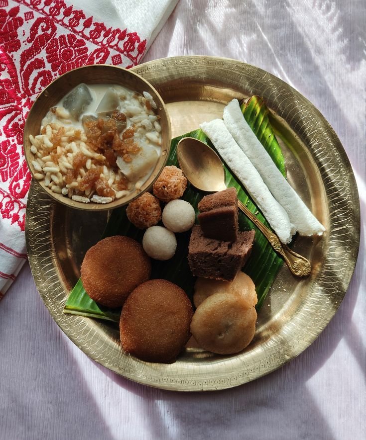 Women wearing traditional sarees celebrating Raja Parba festival in Odisha