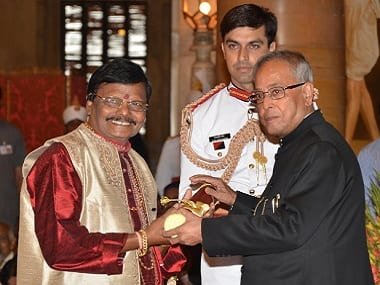 artisans carving stone sculptures at Raghunath Mohapatra workshop Odisha